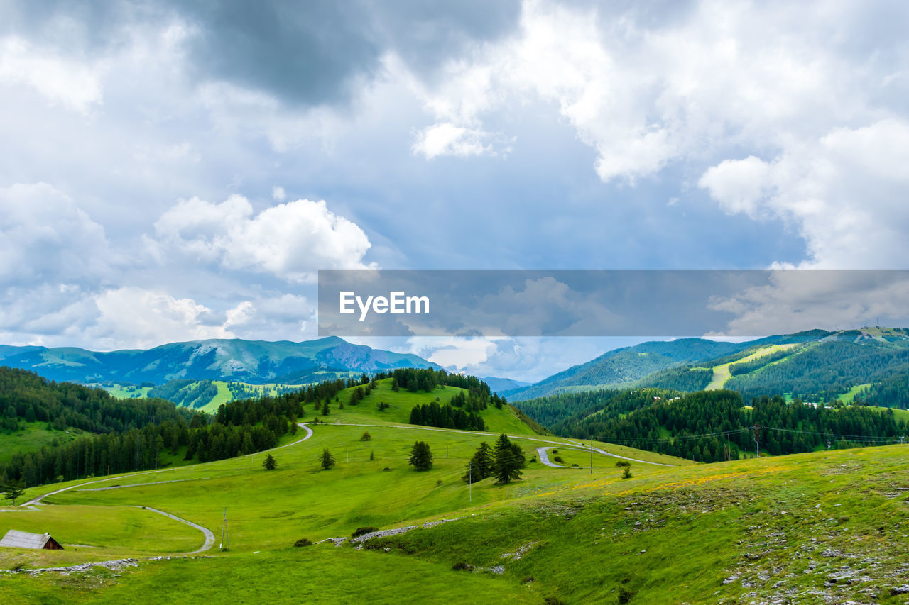 A picturesque landscape view of the french alps mountains on a cloudy summer day