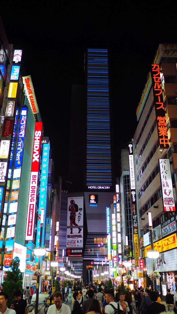 Crowd in city at night