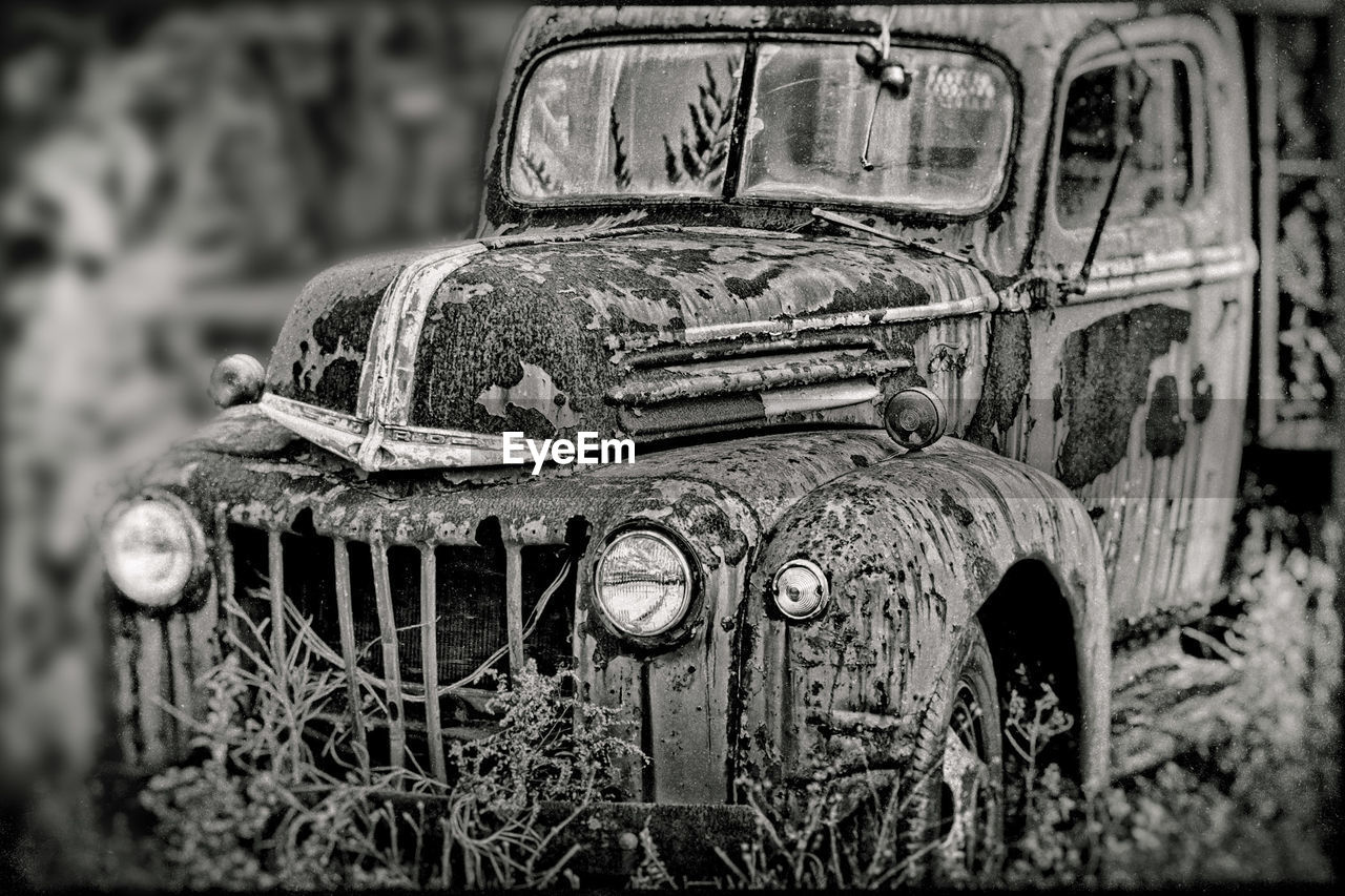 Close-up of abandoned car outdoors