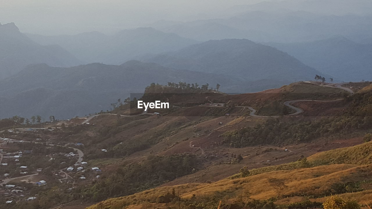 HIGH ANGLE VIEW OF MOUNTAIN RANGE