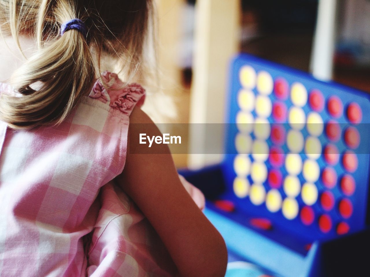 Girl playing connect 4