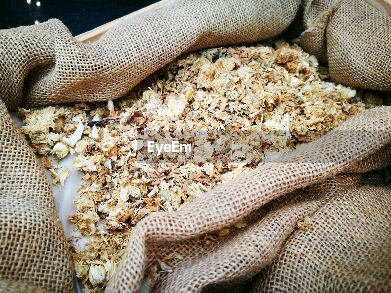 High angle view of dried food in sack