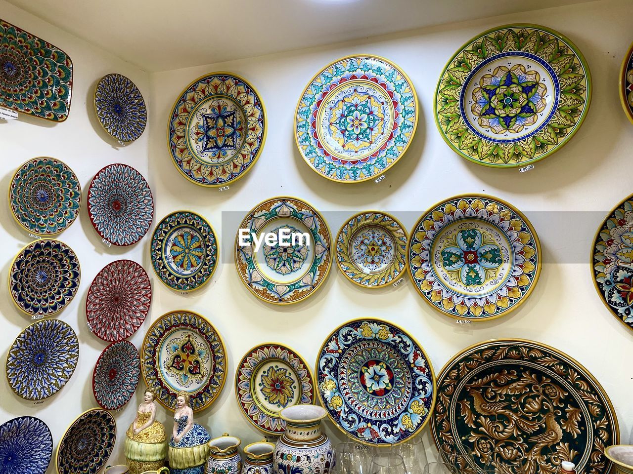 CLOSE-UP OF MULTI COLORED OBJECTS FOR SALE IN PLATE