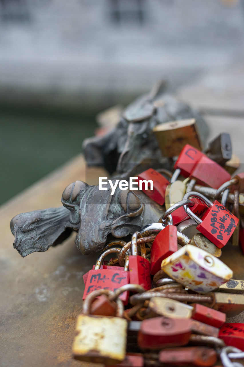 padlock, lock, love, protection, security, positive emotion, emotion, love lock, hope, large group of objects, metal, romance, day, outdoors, selective focus, heart shape, luck, tradition, abundance, bridge, close-up, railing, focus on foreground, architecture, water, travel destinations, nature