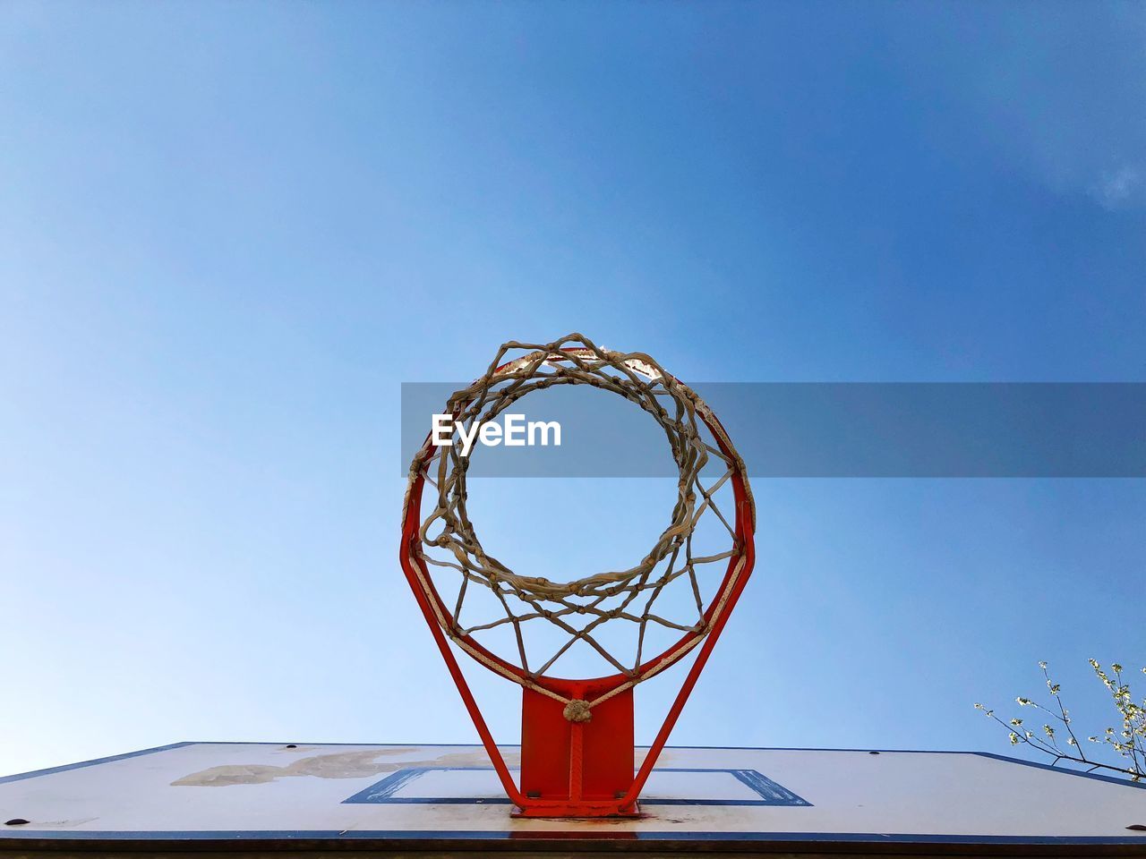 Low angle view of basketball hoop against sky