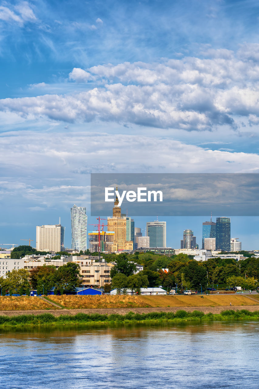 CITY BUILDINGS AGAINST SKY