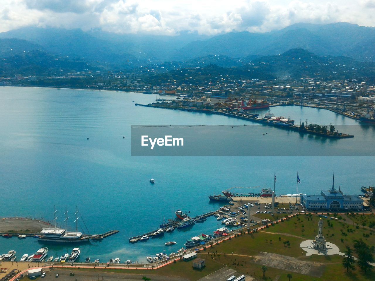 High angle view of harbor and buildings in city