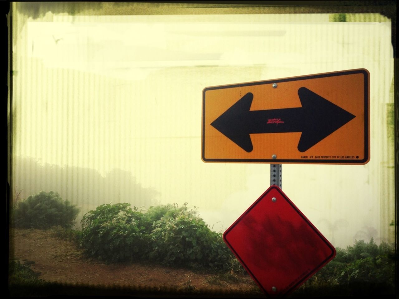 SIGN BOARD ON ROAD