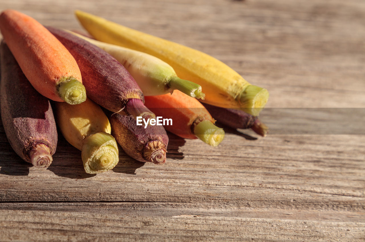 Close-up of vegetables on wooden table