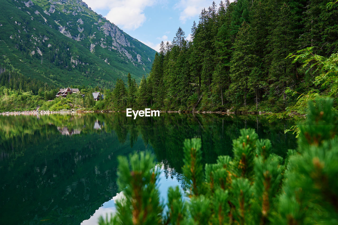 Mountains range near beautiful lake. tatra national park in poland. morskie oko or sea eye lake