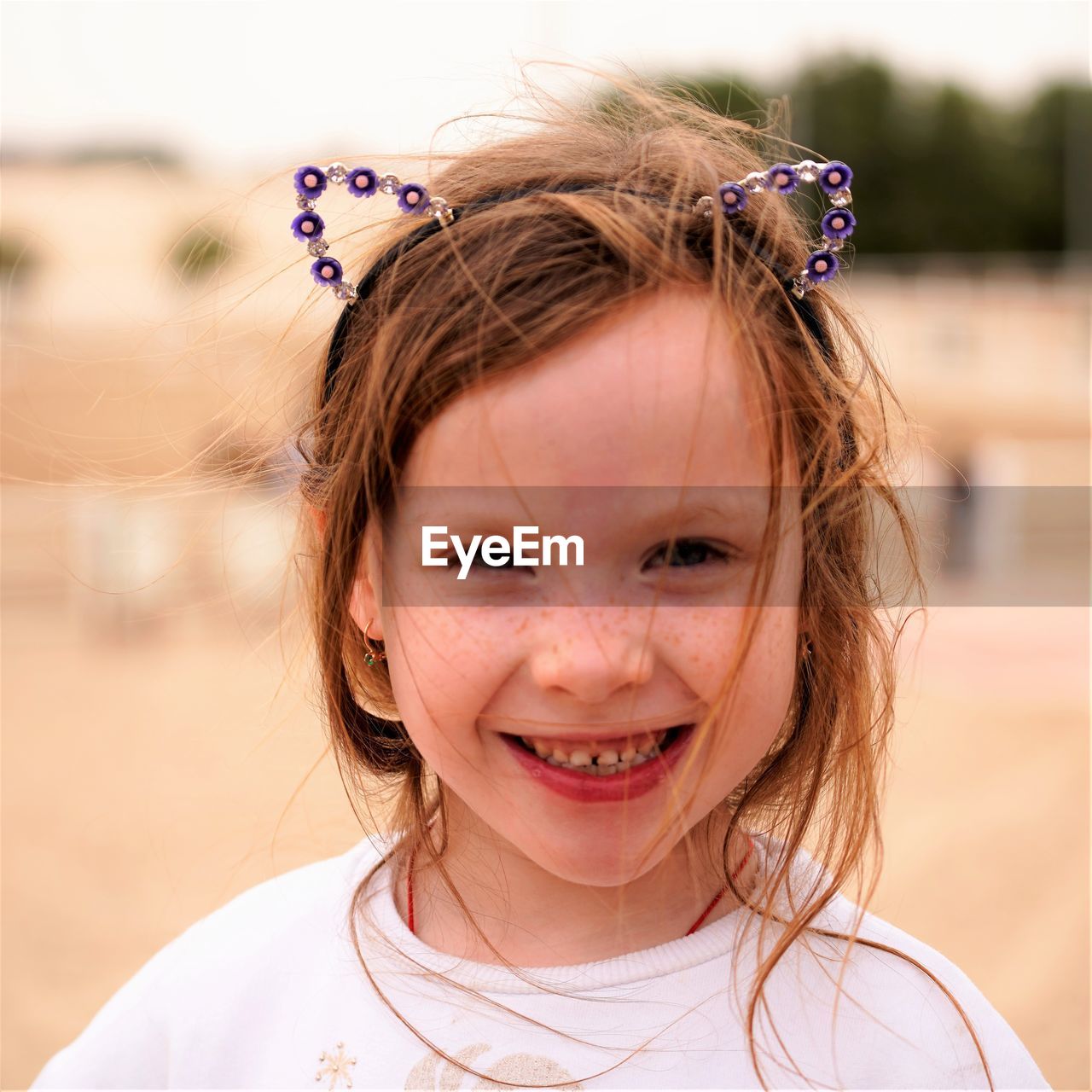 Close-up portrait of smiling girl