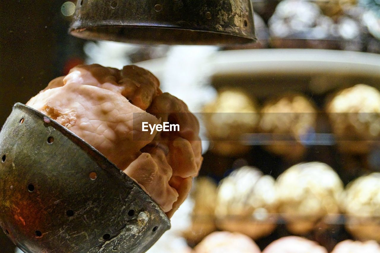 CLOSE-UP OF FOOD IN CONTAINER