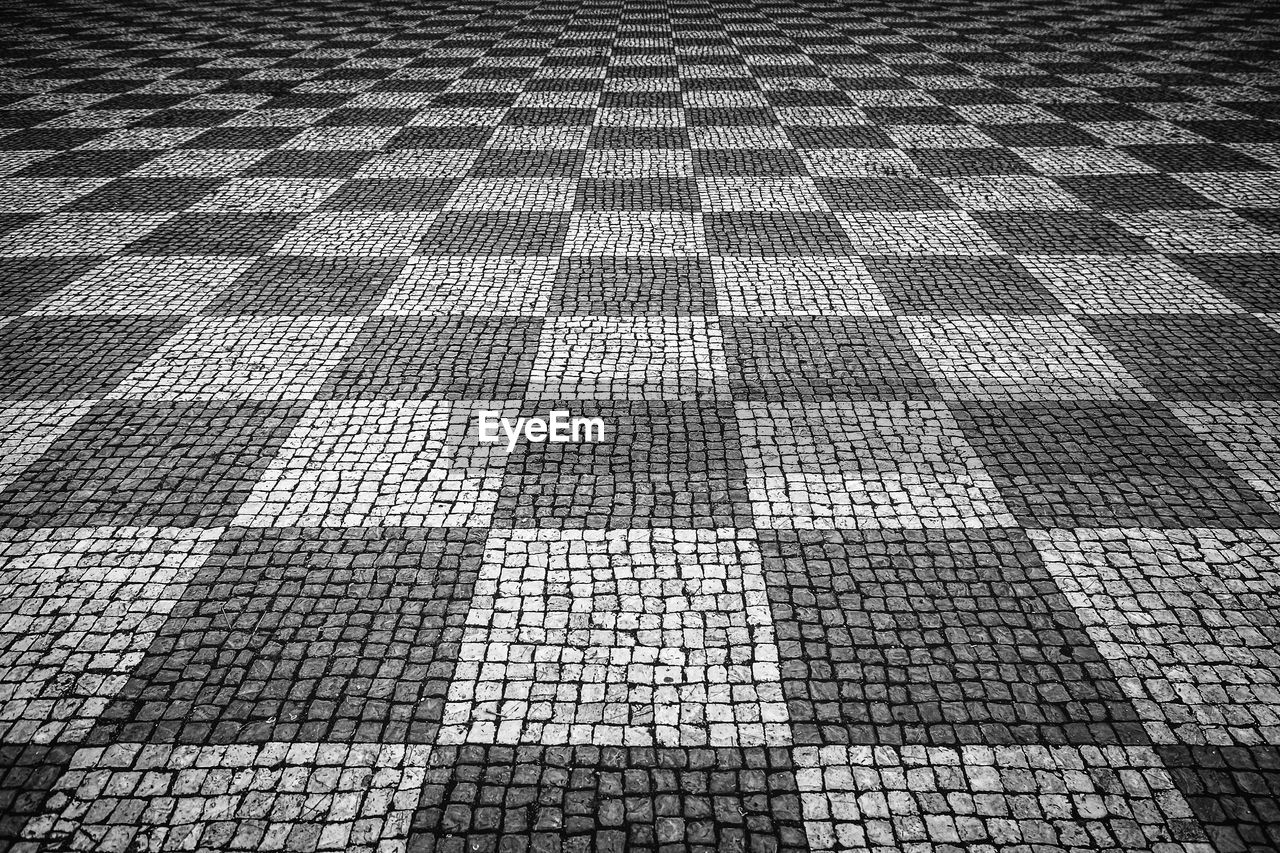 Full frame shot of checked pattern cobbled footpath