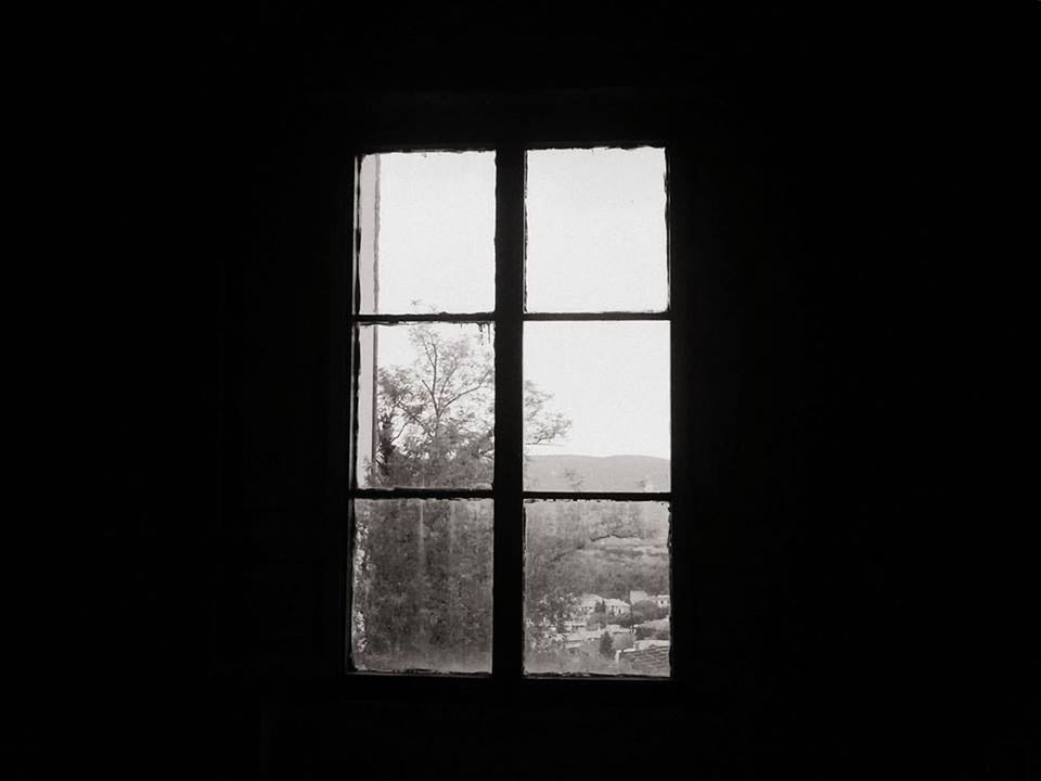 Close-up of window in the dark