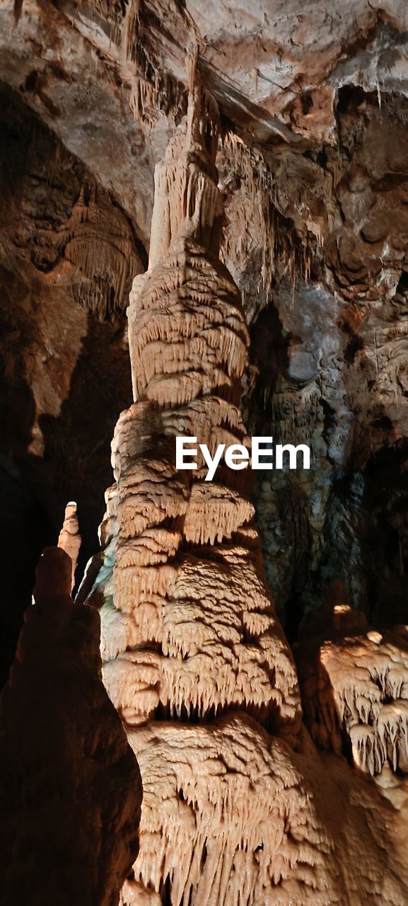 rock, rock formation, geology, travel destinations, physical geography, nature, travel, non-urban scene, beauty in nature, cave, eroded, land, arch, scenics - nature, tranquility, day, outdoors, wadi, tourism, no people, environment, sunlight, canyon, landscape, sandstone, discovery, formation, mountain, leisure activity
