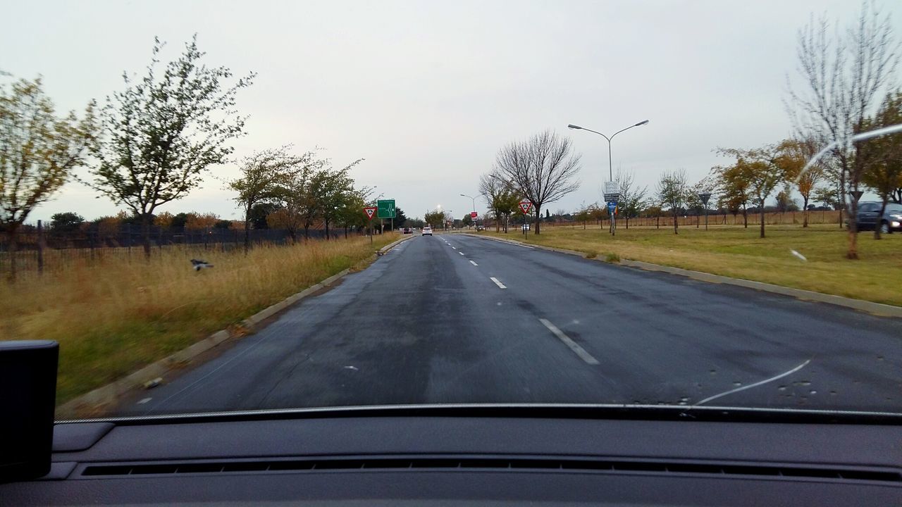 ROAD PASSING THROUGH LANDSCAPE