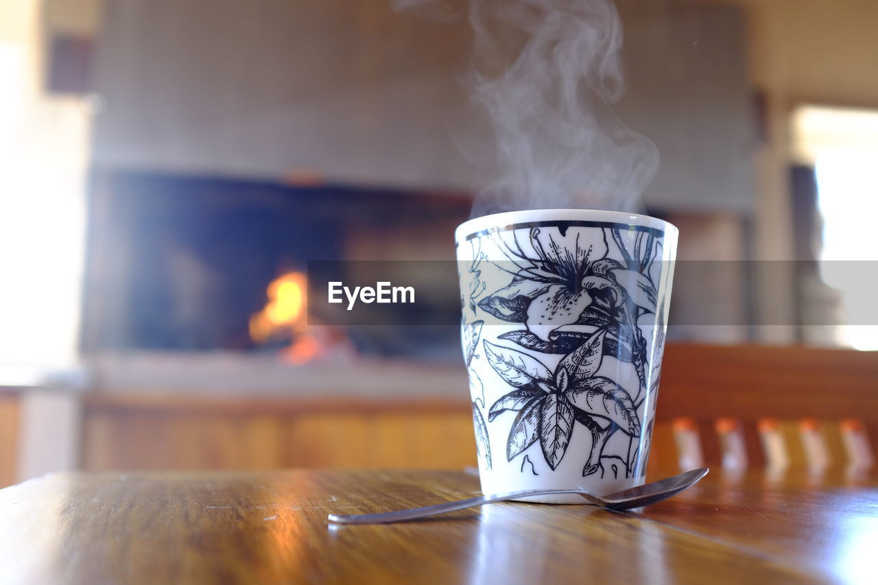 Close-up of tea cup on table