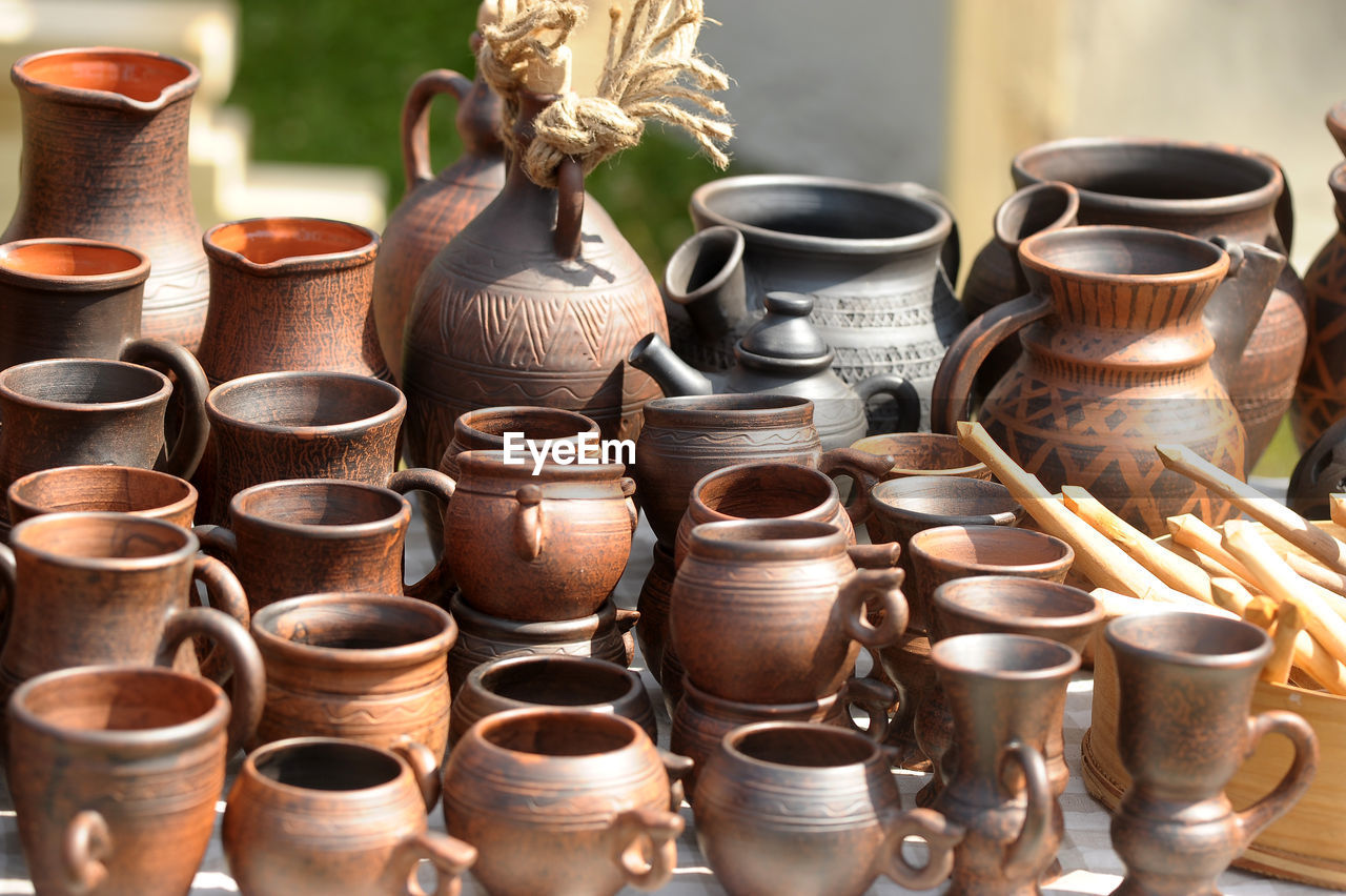 CLOSE-UP OF VARIOUS CONTAINERS