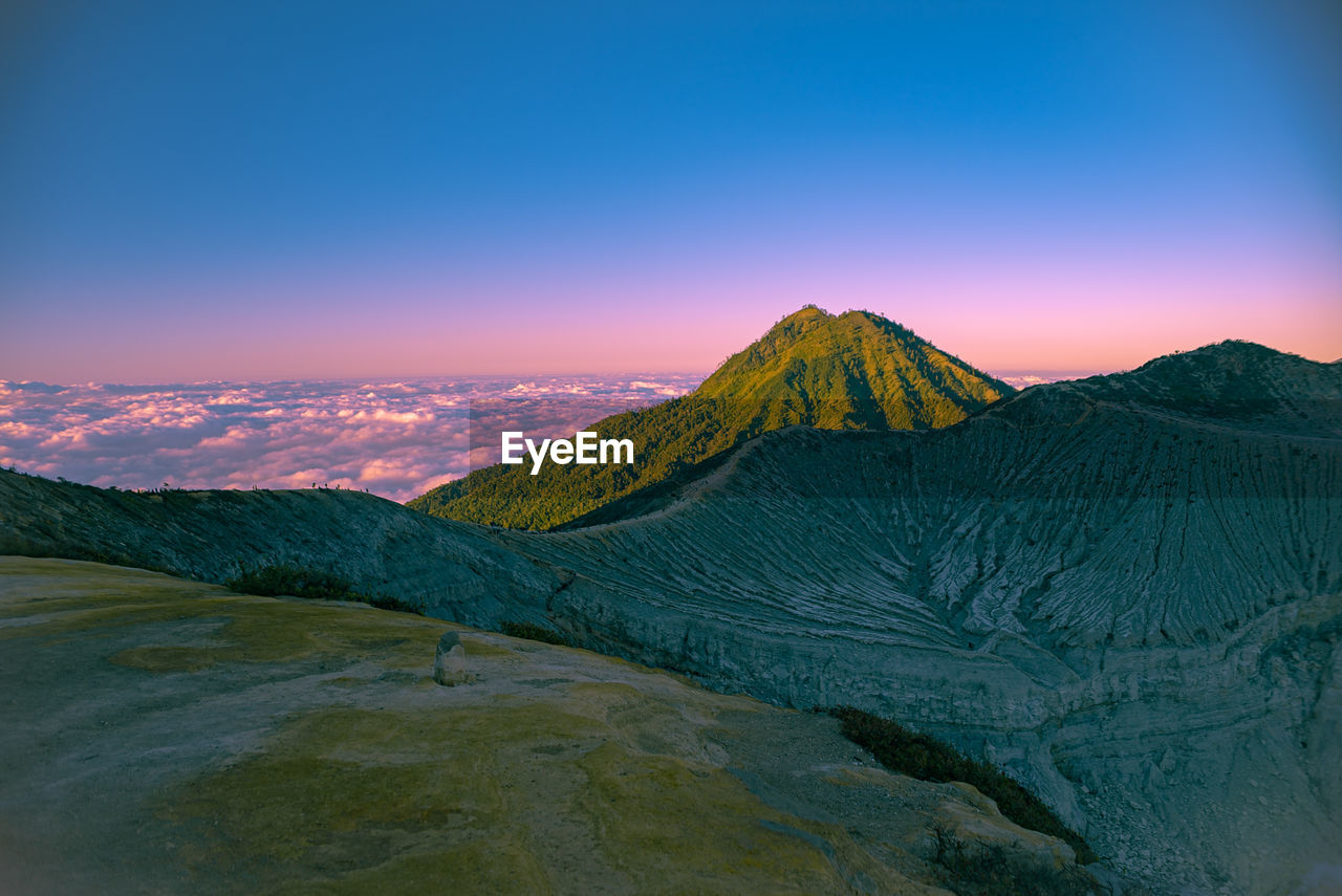 Scenic view of mountain against sky during sunrise at ijen mount, indonesia. colorful sky sunrise. 