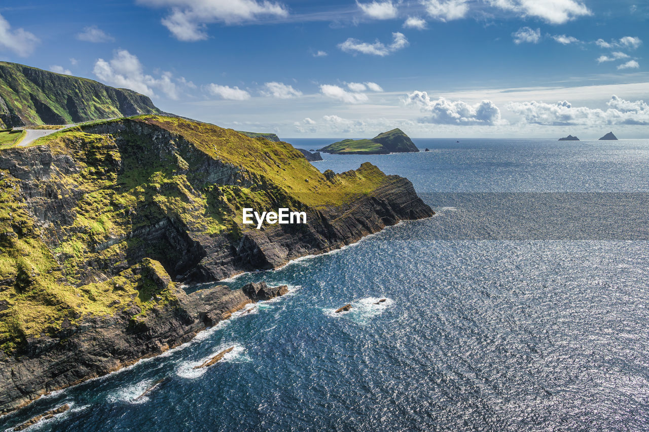 Kerry cliffs and a view on skellig michael island. star wars film location, ring of kerry, ireland