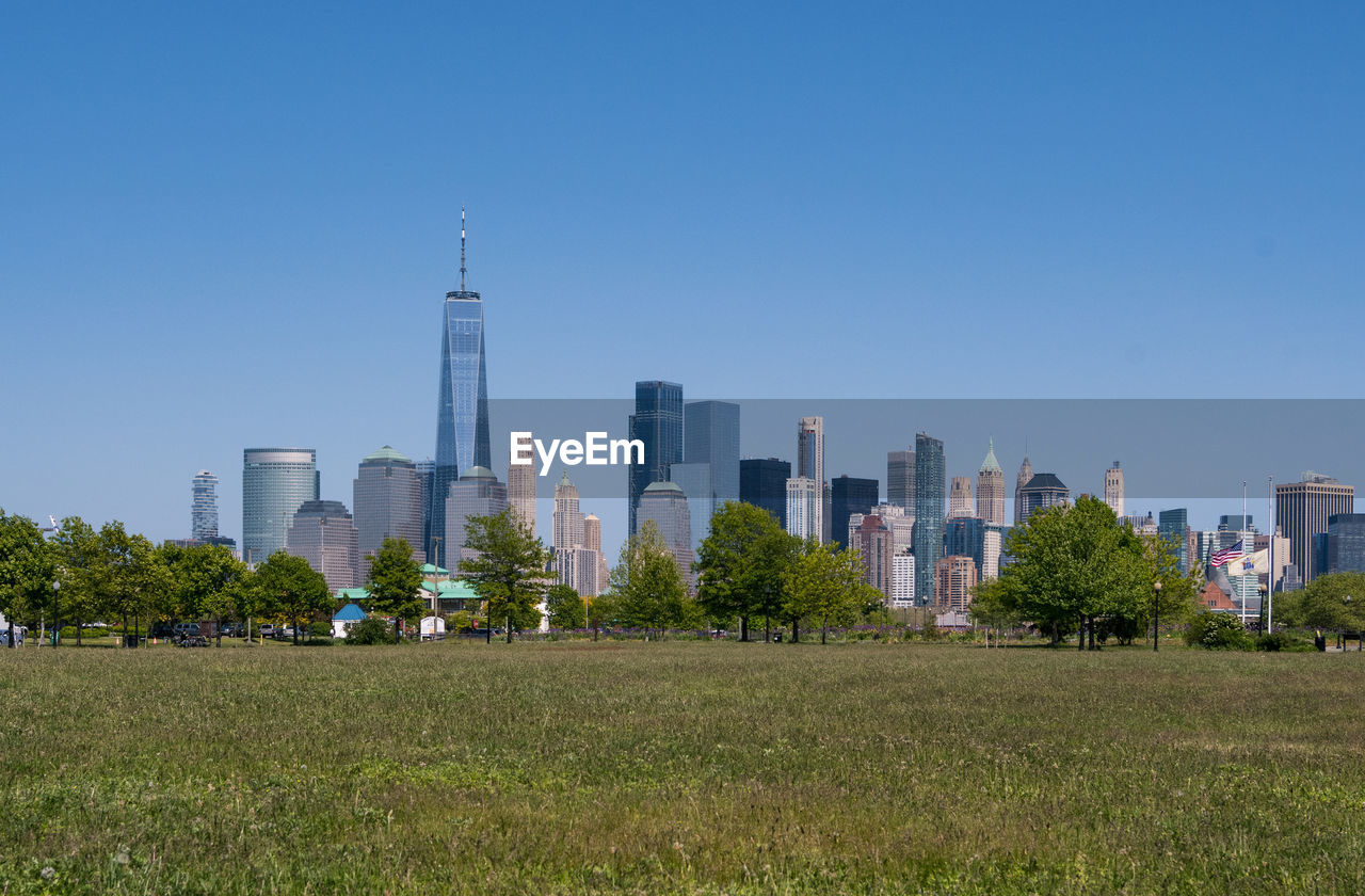 View of modern buildings against clear sky