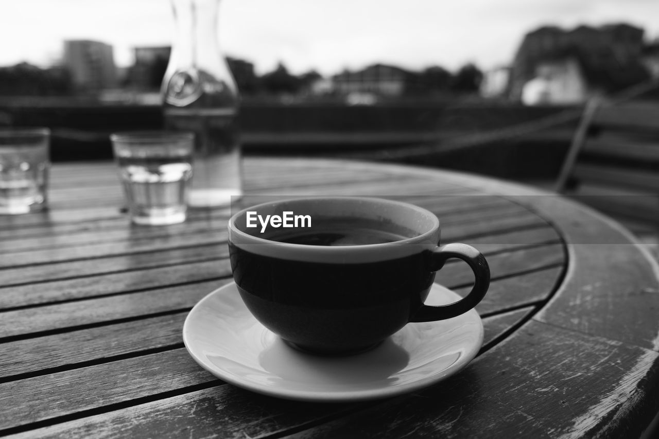 Close-up of coffee cup on table