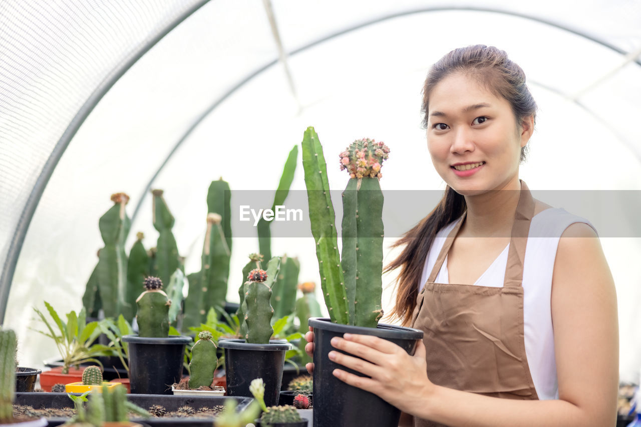 Cactus gardening is a popular pastime among asian women.