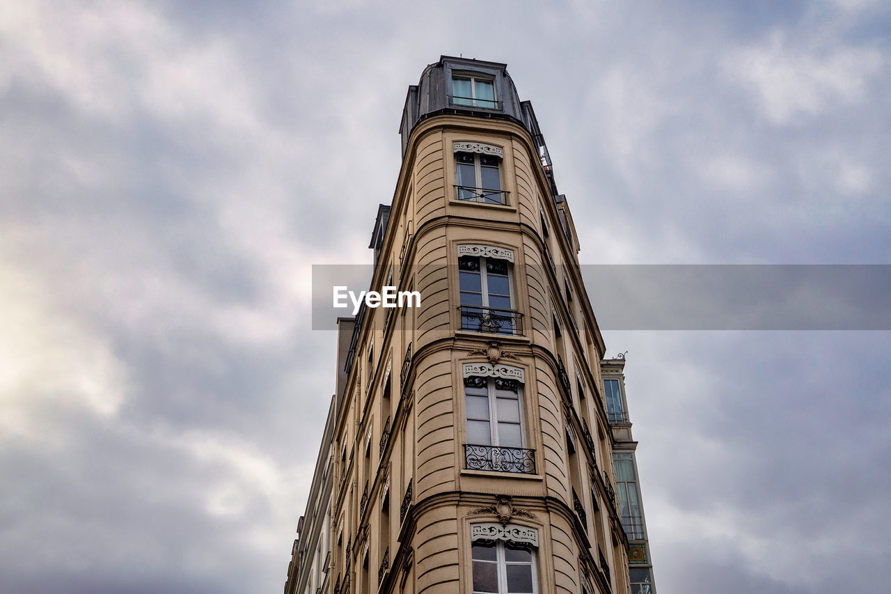 architecture, sky, landmark, built structure, tower, building exterior, cloud, low angle view, skyscraper, building, nature, tower block, city, urban area, no people, history, blue, the past, spire, outdoors, travel destinations, day, travel, steeple, window