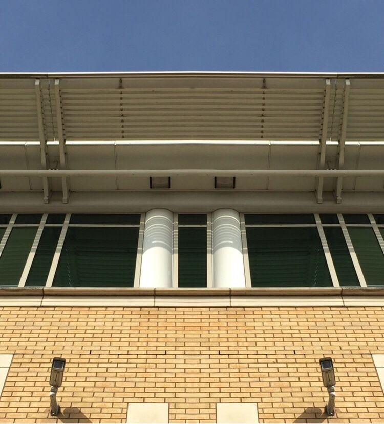 LOW ANGLE VIEW OF MODERN BUILDINGS