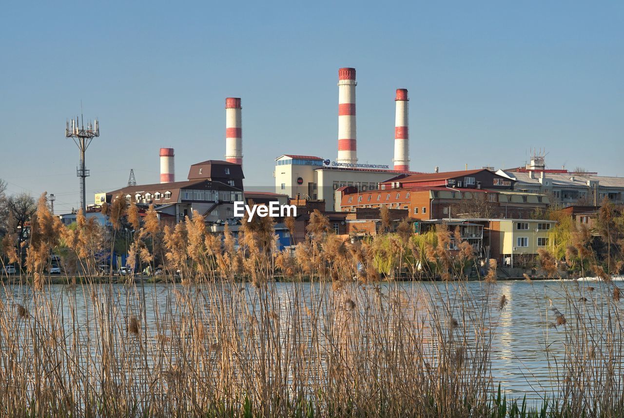 FACTORY AGAINST SKY IN CITY