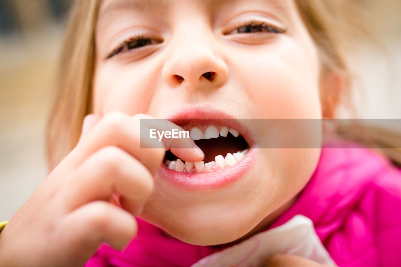 Close-up portrait of a funny girl