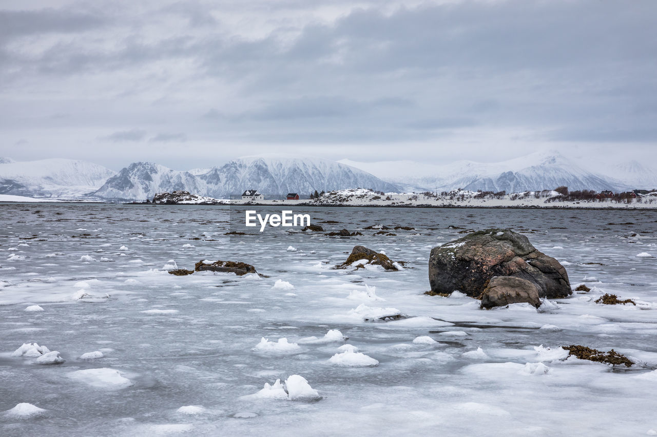 Scenic view of sea against sky during winter