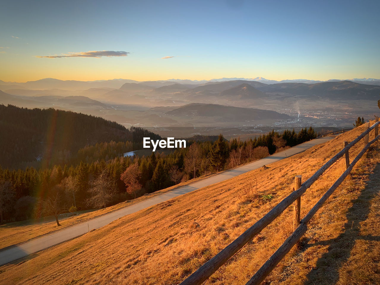 Scenic view of landscape against sky during sunset