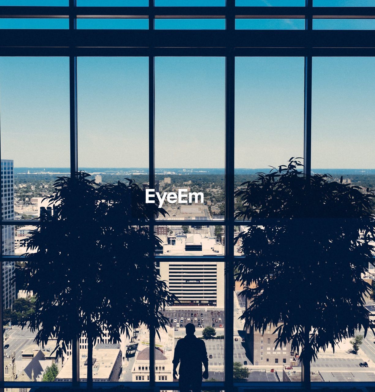 City viewed through from a window of a building