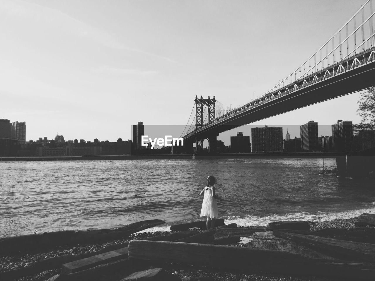 Manhattan bridge with cityscape in background