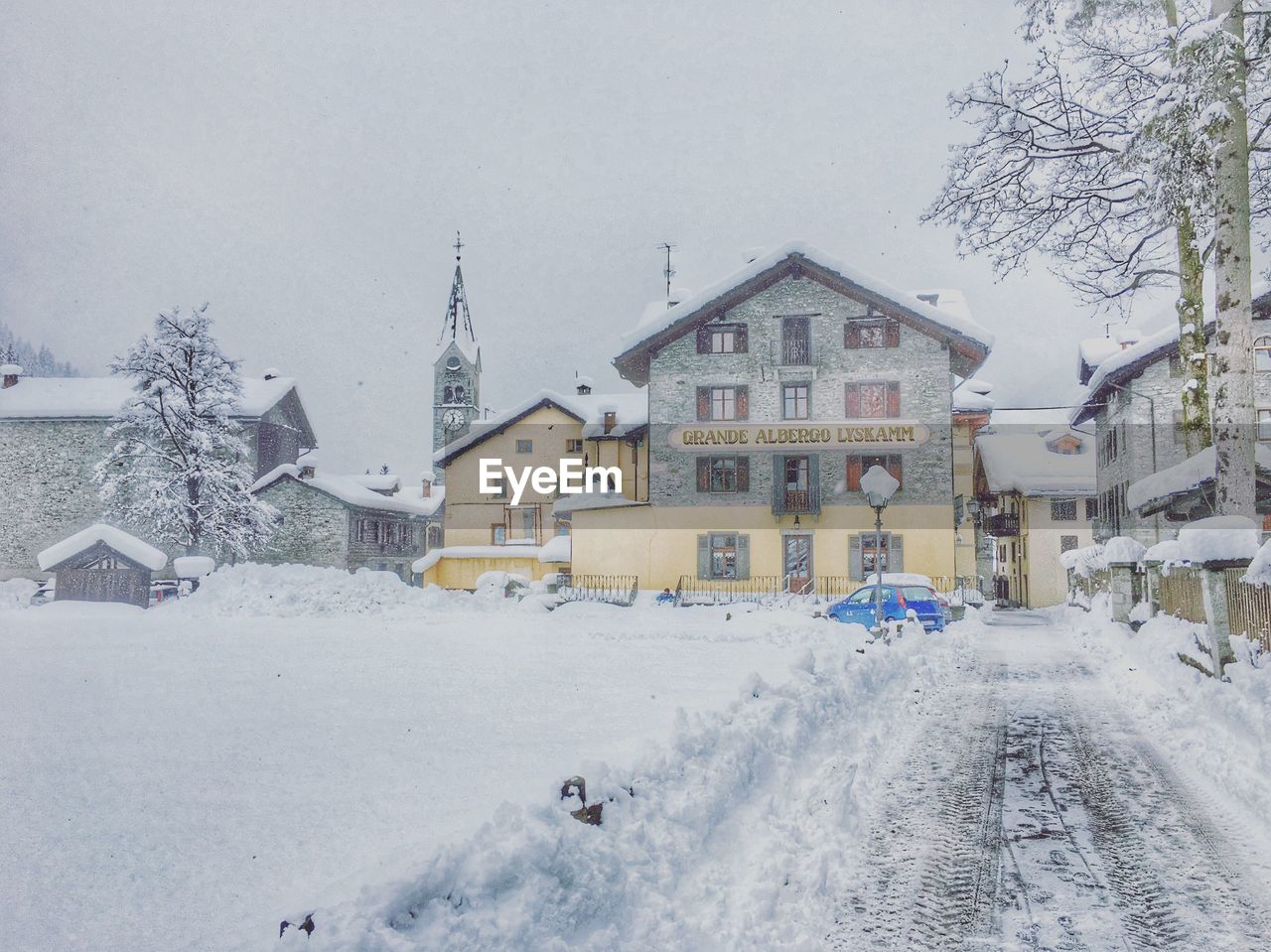 VIEW OF SNOW COVERED HOUSES