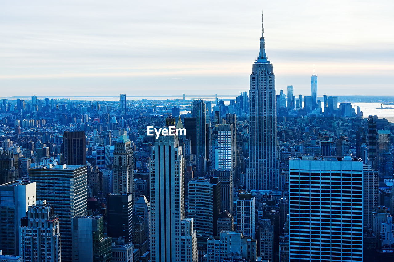 AERIAL VIEW OF BUILDINGS AGAINST SKY