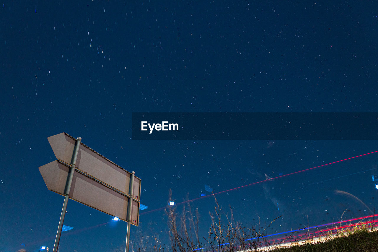 Low angle view of illuminated stars against sky at night