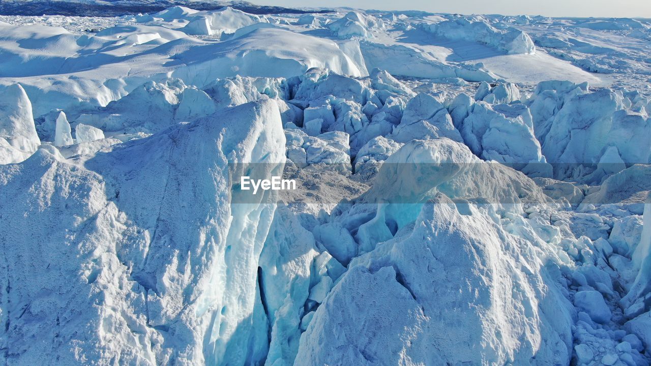 SCENIC VIEW OF SNOWCAPPED LANDSCAPE AGAINST MAJESTIC SKY