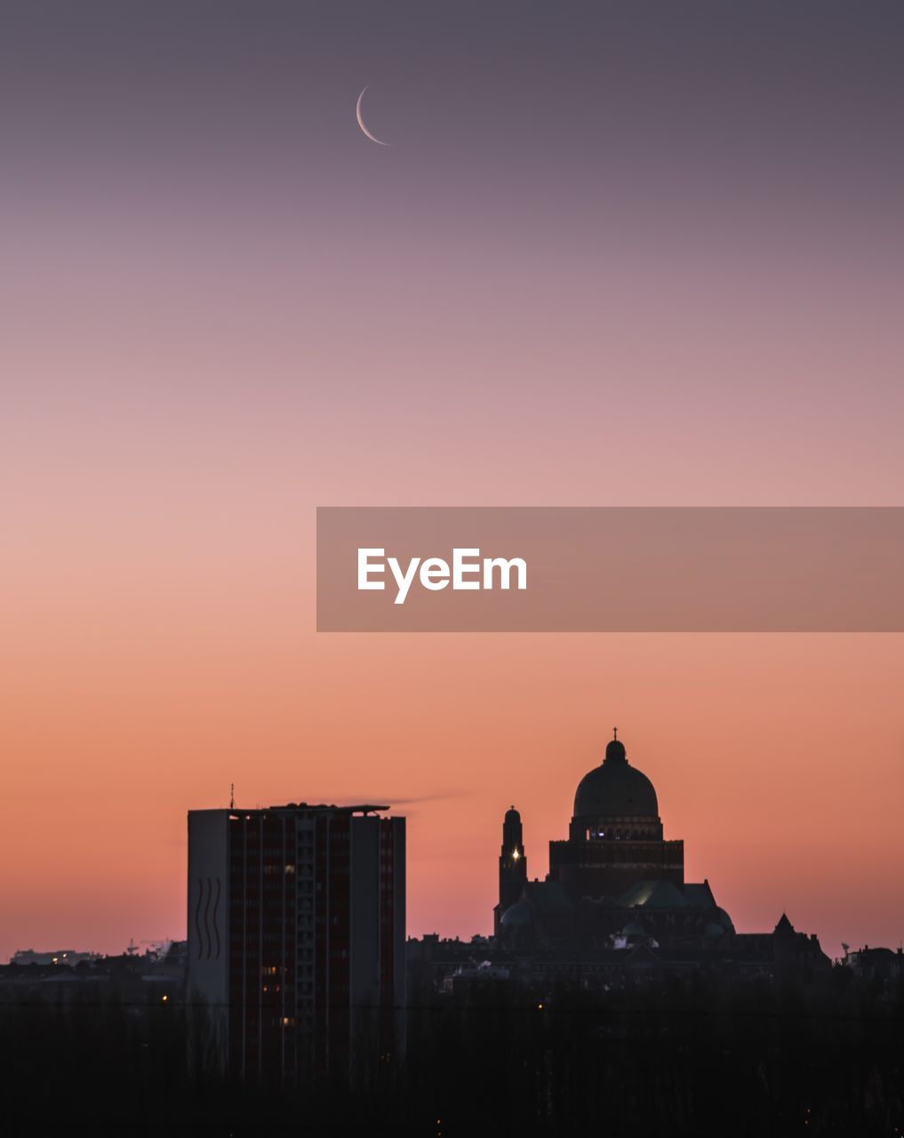 Silhouette of city at dusk