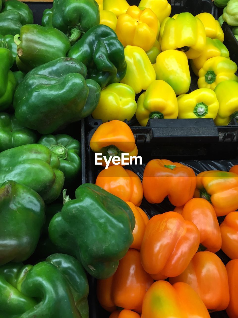 High angle view of bell peppers for sale at market stall