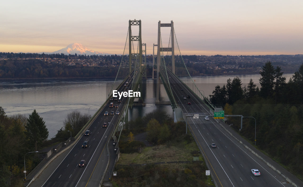 High angle view of bridge over river against sky during sunset