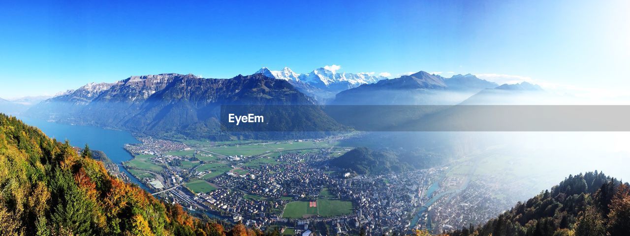 High angle shot of townscape against mountain range