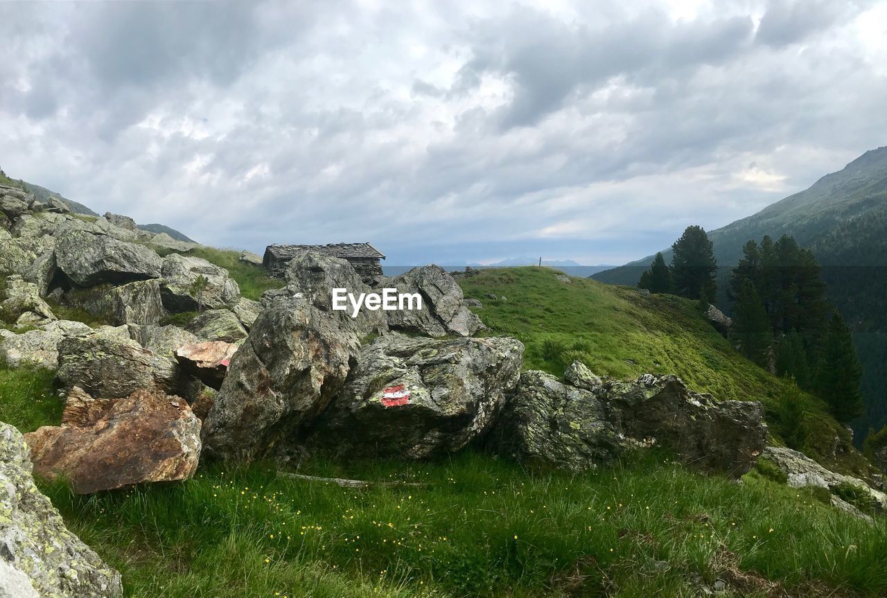 Panoramic shot of rocks on land against sky