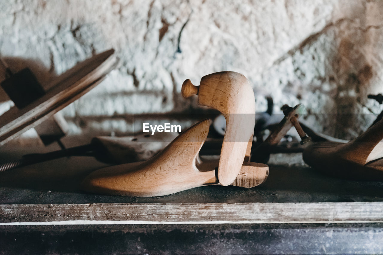 Close-up of wooden equipment on table