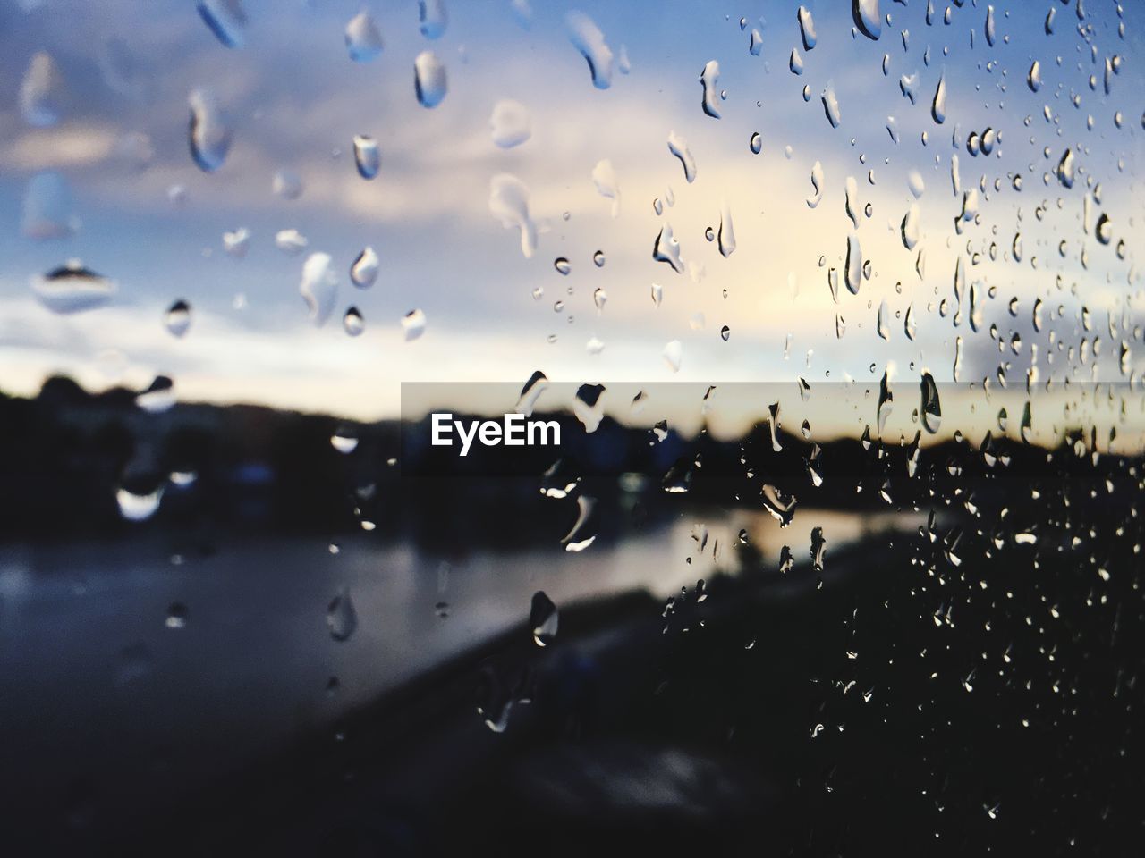 Close-up of raindrop on glass