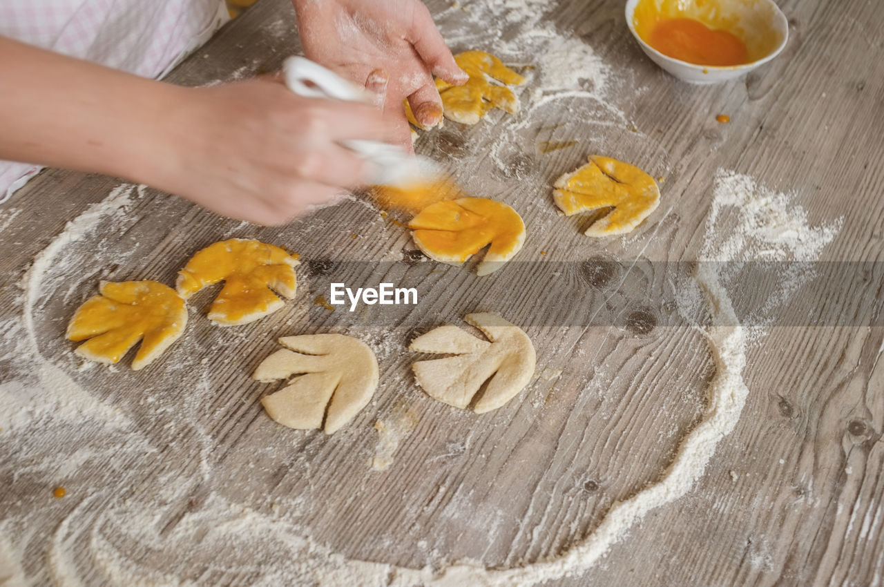 Cropped image of woman preparing food