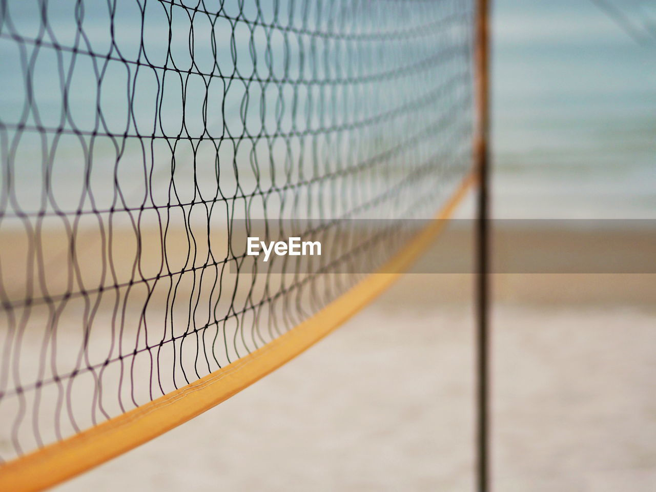 Close-up of net at beach
