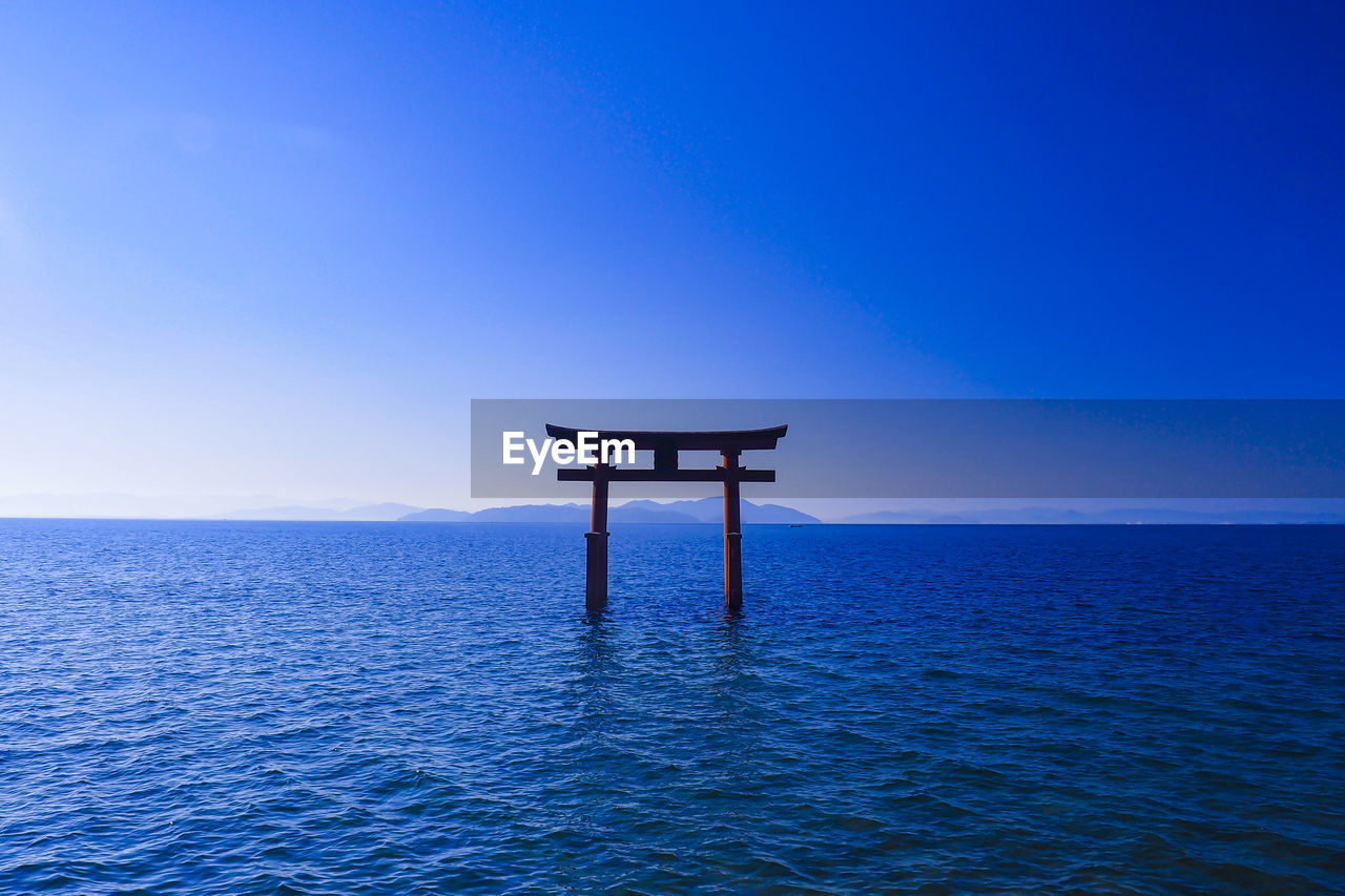 Torii of shirahige shrine on lake biwa