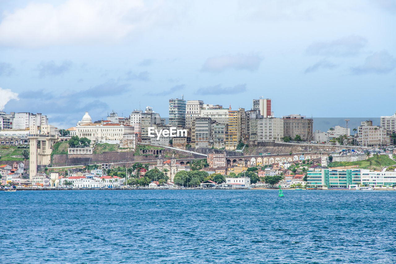 View of city against cloudy sky